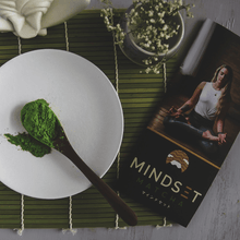 Load image into Gallery viewer, Matcha on a plate beside meditating woman photo and mindset matcha logo