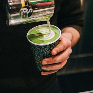 Pouring Organic Matcha Latte